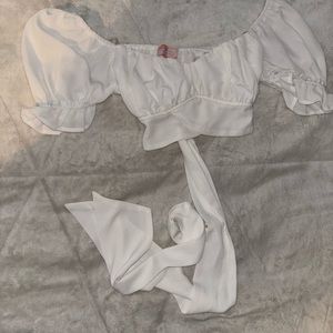 white off the shoulder crop top. ribbon to tie a bow